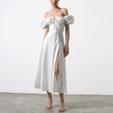 Robe longue à manches bouffantes et fente haute, couleur unie